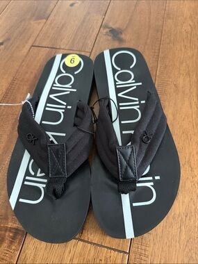 Calvin Klein Black Flip Flops with White Stripe
